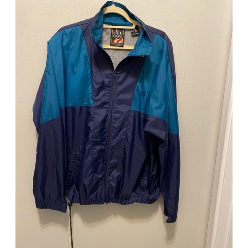 USA Olympic jacket in blue and teal green. embroidered on the left chest. Sz L